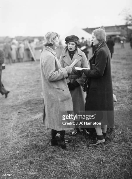Hon Miss Pamela Herman Hodge, Hon Miss Deborah Mitford and Lady Margaret Oqilvy at the Point-to-Point Steeplechases Races at Iene Buildings, Enstone,...