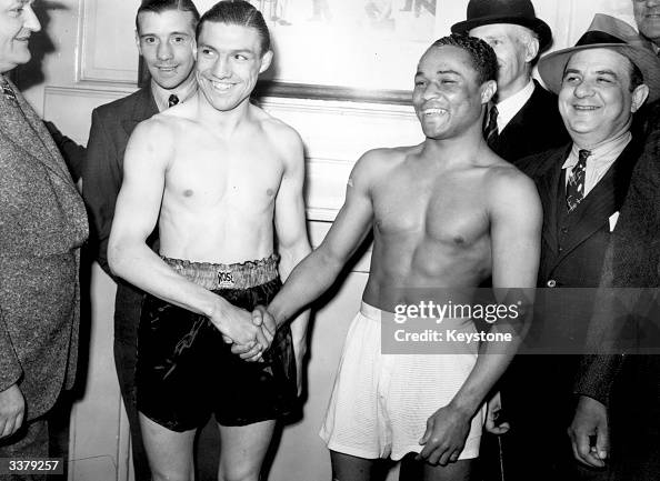 Eric Ricker Boxer British boxer Ernie Roderick shaking hands with his opponent before a ...