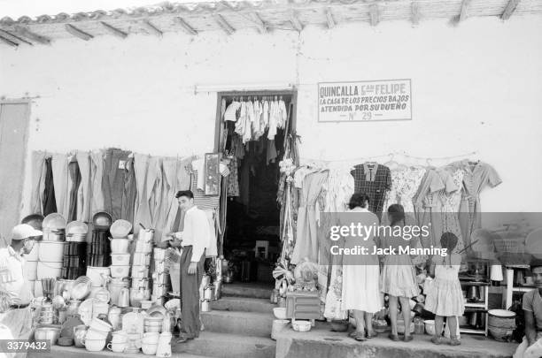 Pavement shop selling domestic goods and clothes in central Caracas, Venezuela.