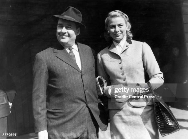 Swedish film star Ingrid Bergman is met by her second husband, Italian director Roberto Rossellini at London's Victoria Station, after journeying...