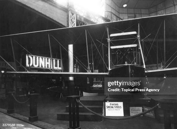 The Sopwith Bat Boat, on display at the Aero Show, Olympia, London, in front of a Dunhill stand.