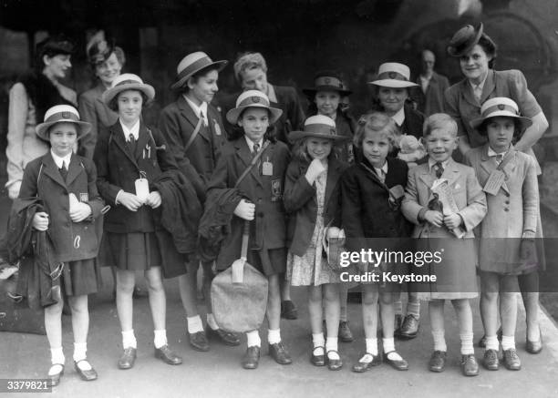 Group of girls from Putney High School waiting at London's King's Cross Station for a train to Bridlington in Yorkshire, where they are to spend a...