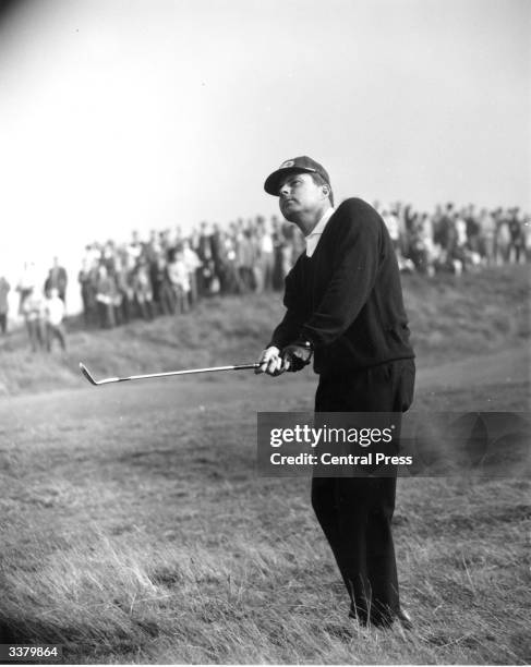 British golfer Peter Alliss playing from the rough onto the fourth green during the first day of the Ryder Cup.