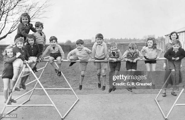 Seven sets of twins who all go to the same school, the Egham Hythe Primary School in Surrey Joan, Davis, Gillian and Judith Dickens, Janet Davis,...