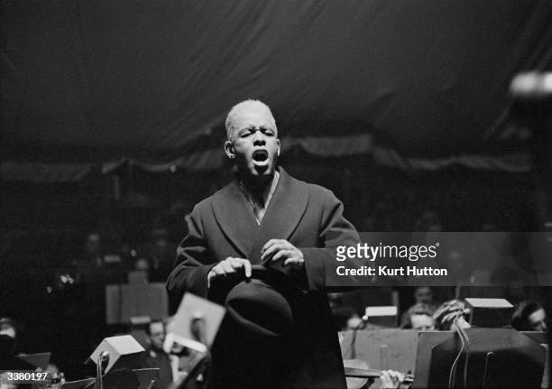 American tenor Roland Hayes , one of the first black singers on stage during the twenties, singing at an Allied Forces concert organized by the Daily...