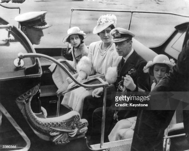 The royal family arriving at the Royal Naval College in Dartmouth, July 1939. From centre, left to right: Princess Margaret , Queen Elizabeth, King...