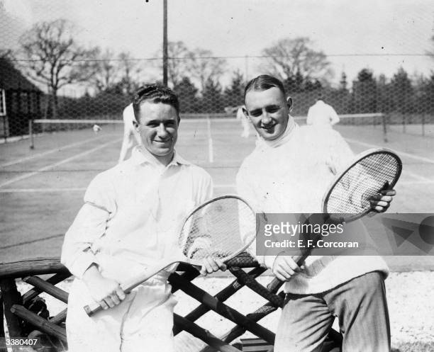 Two members of the Australian cricket team on tennis courts at Ifield Golf Club near Crawley, West Sussex.