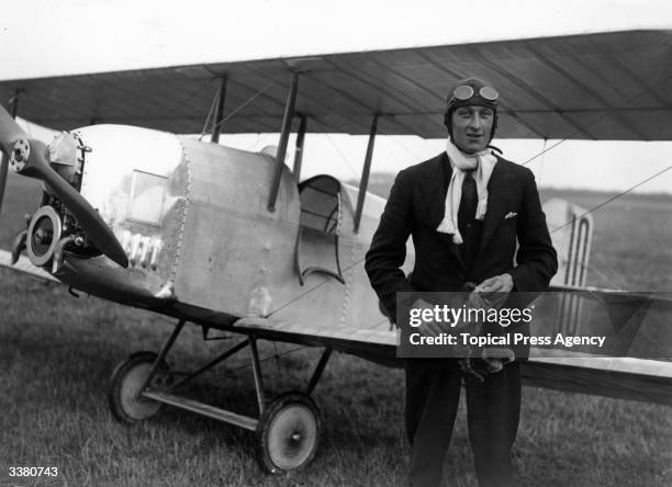 Captain Stan Cockerell standing by his Vickers Viget biplane at the first Lympne light aircraft competition, Keny, October 1923. The Viget was...