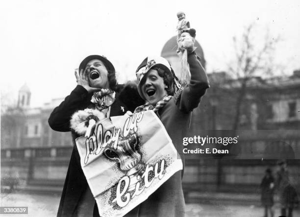 Couple of Manchester City Football Club fans voice their enthusiasm in Trafalgar Square on the day of their team's FA Cup final match against...