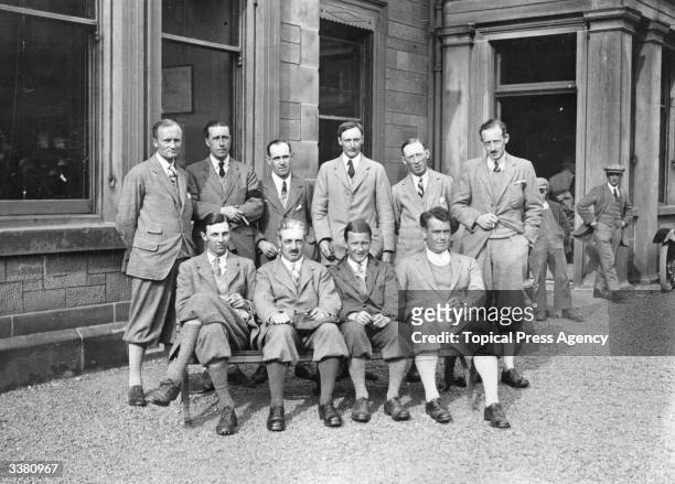 Members of the 1923 British Walker Cup golf team posing for a portrait at St Andrews Golf Club in Fife. The team was captained by Robert Harris and...