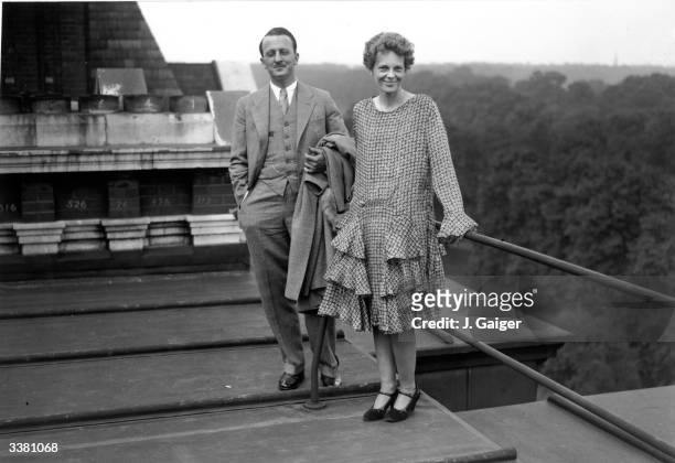 American aviator, Amelia Earhart on the roof of the Hyde Park Hotel in London with Captain Railey.