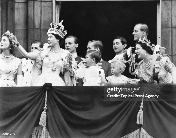 Queen Elizabeth II with Charles, Prince of Wales, Anne the Princess Royal, Prince Philip the Duke of Edinburgh, and the Queen Elizabeth the Queen...