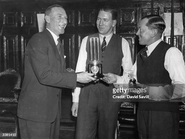 County Cricketers Billiards Championships at Burroughes Hall, Soho Square, London. Douglas R Jardine England cricket captain, presenting the winners...