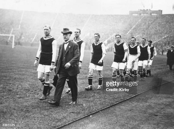 The manager and players of Aston Villa take the field at Wembley for their FA Cup final clash with Newcastle United. Newcastle United FC win 2-0