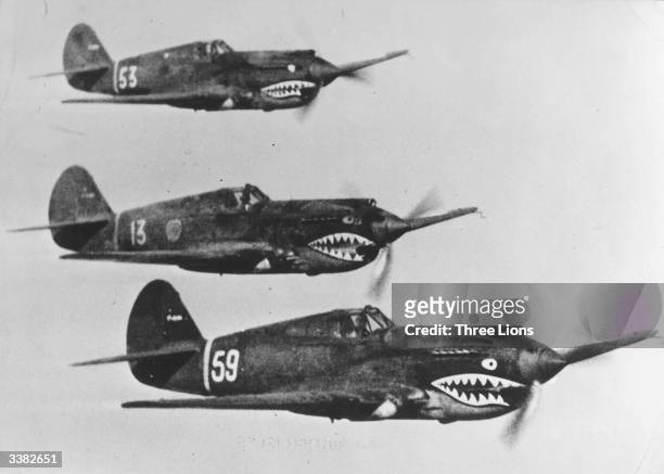American Volunteer Group aircraft, known by the Chinese as 'flying tigers', flying in tight formation on the Far Eastern front, where they are aiding...
