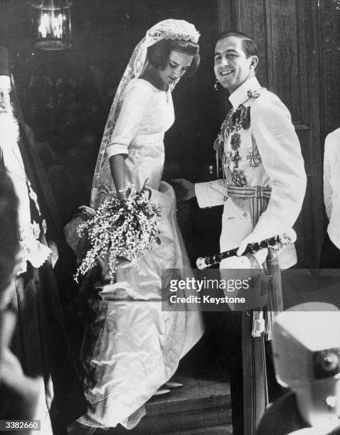 King Constantine II of the Hellenes and Queen Anne-Marie of the Hellenes, nee Princess Anne-Marie of Denmark, during their wedding day in Athens.