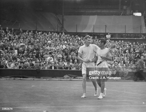 Frank Parker of the USA congratulates Lennart Bergelin of Sweden on winning their match at the Wimbledon Lawn Tennis Championships.