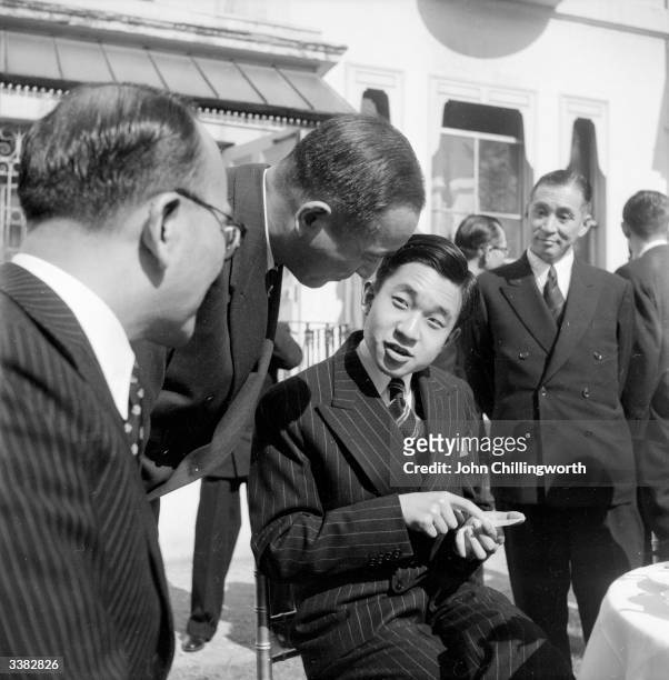 Emperor Akihito of Japan, as Crown Prince Akihito of Japan, during a visit to London to attend the coronation of Queen Elizabeth II. Original...