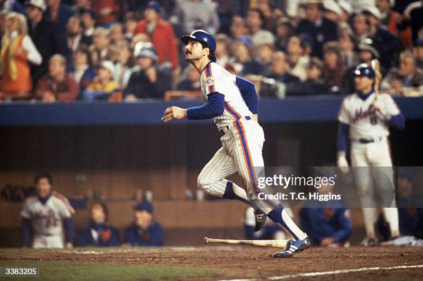 First baseman Keith Hernandez of the New York Mets looks for the ball he hit during game 7 of the 1986 World Series against the Boston Red Sox at...