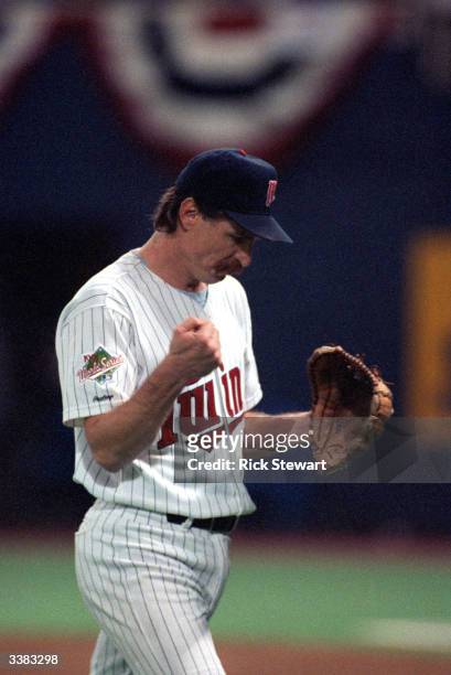 Pitcher Jack Morris of the Minnesota Twins pumps his fist during the 1991 World Series game against the Atlanta Braves in October of 1991 at the...
