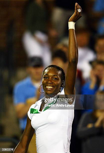 Venus Williams waves to the crowd after her match against Marie-Gayanay Mikaelian of Switzerland during the Family Circle Cup on April 15, 2004 at...
