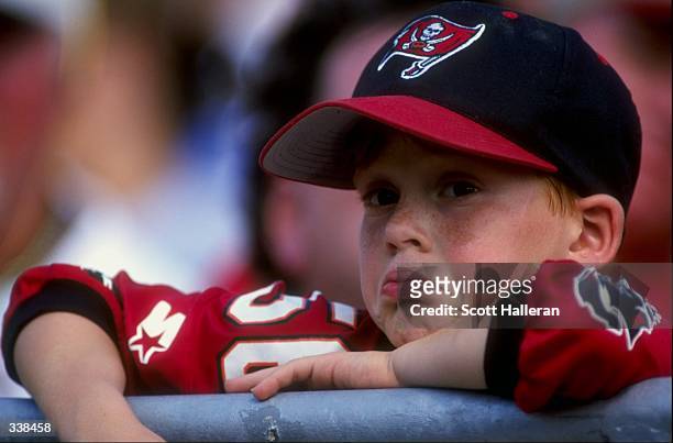 Tampa Bay Buccaneers fan looks unhappy during a game against the Carolina Panthers at the Raymond James Stadium in Tampa, Florida. The Buccaneers...