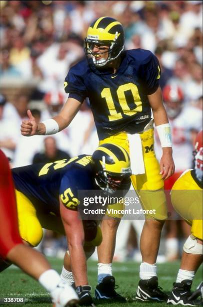 Quarterback Tom Brady of the Michigan Wolverines in action during the game against the Syracuse Orangemen at the Michigan Stadium in Ann Arbor,...