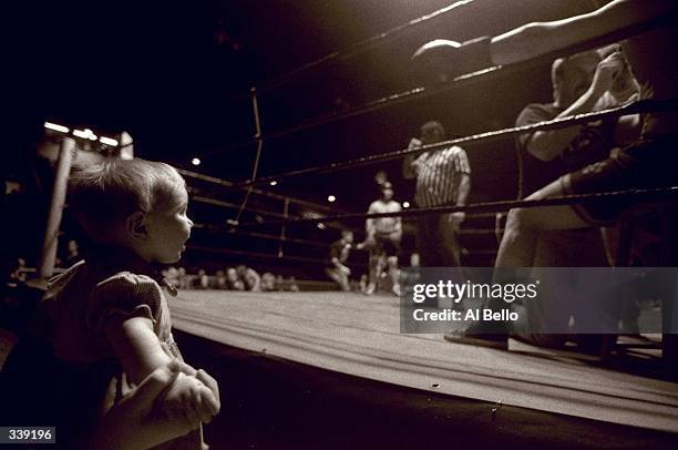 General view of a baby watching the action during the Toughman Contest in Kalamazoo, Michigan. Mandatory Credit: Al Bello /Allsport