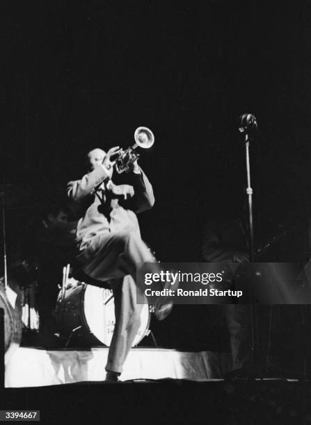 American jazz trumpeter Charlie Shavers playing with members of Cab Calloway's former band during a 'Jazz at the Philharmonic' concert, August 1953....