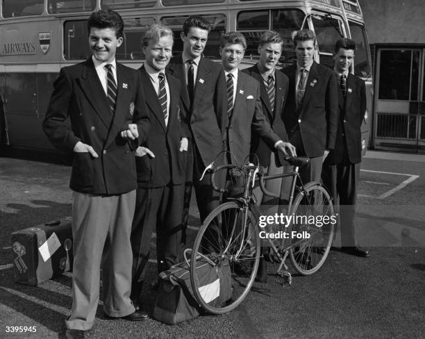 British cyclists, Alan Dawson, Eric Thomson, Mike Gambrell, Don Burgess, Peter Brotherton, John Geddes and Tommy Simpson, at Waterloo air terminal,...