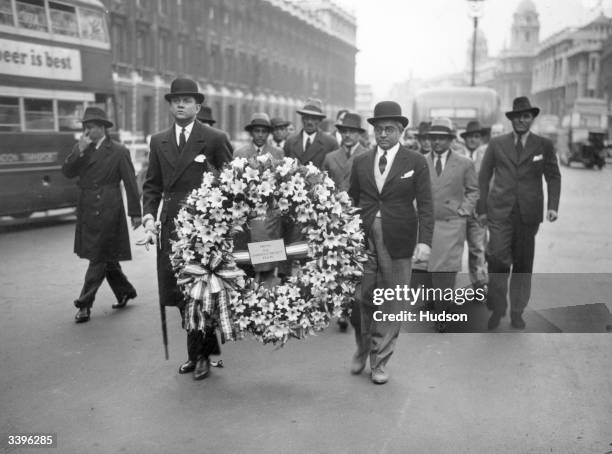 On the right Vizianagram , captain of the Indian cricket team with other members carrying a wreath to the Cenotaph, London.