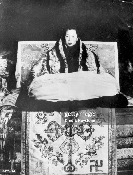 The boy Dalai Lama, Tenzin Gyatso at Lhasa. He and the Regent of Tibet were 'prevented' from leaving Lhasa, the capital by opposition from the lamas...