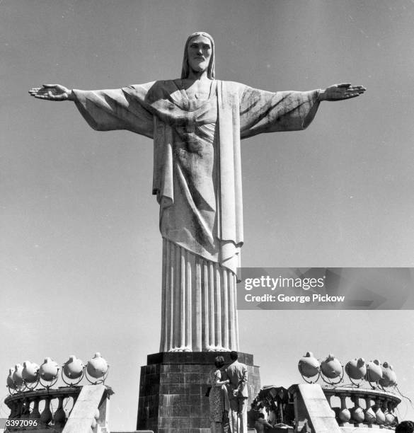 The statue of Jesus stands on the summit of the Corcovado Mountain overlooking Rio de Janeiro, Brazil.