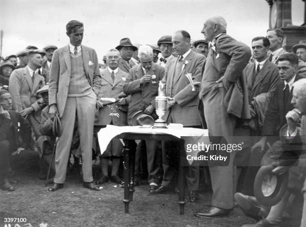 The captain of the Prestwick Golf Club speaking before presenting the British Open Golf trophy to American golfer Jim Barnes . This was the last Open...