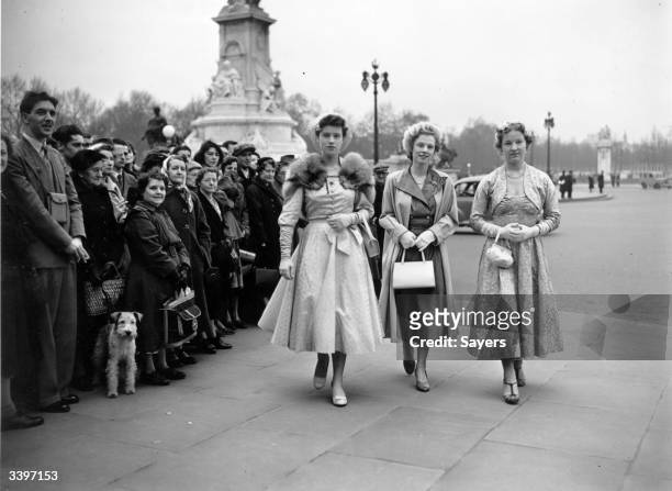 Debutantes arriving at Buckingham Palace for a Presentation Party hosted by Queen Elizabeth The Queen Mother on behalf of Queen Elizabeth II.