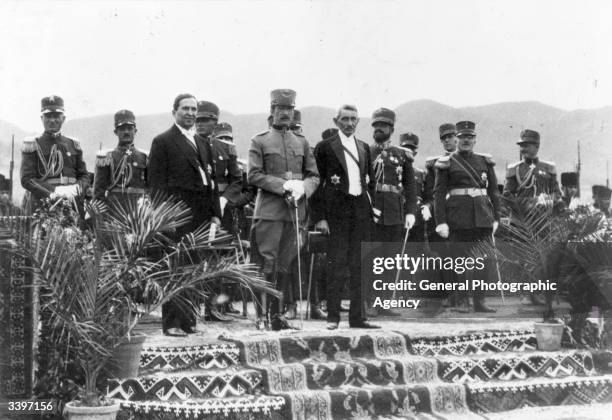 King Zog I of Albania stands surrounded by his ministers during his birthday celebrations.