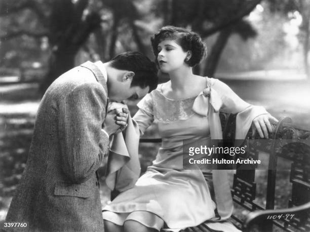 Charles 'Buddy' Rogers as Robert de Bellecontre and Clara Bow as Nancy Worthington in the film 'Get Your Man', directed by Dorothy Arzner and...