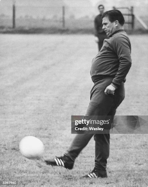 Manager of Greek football team Panathinaikos, Ferenc Puskas joining the training session for the European Cup Final against Ajax held at Wembley.