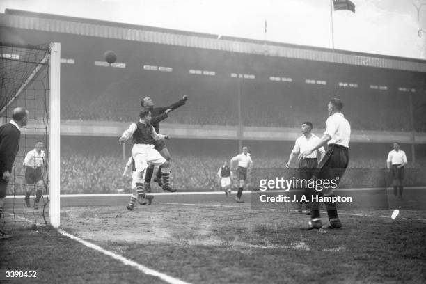 Arsenal FC v Middlesbrough FC. Middlesbrough goalkeeper punches away the ball from Alex James . Arsenal won 8-0.