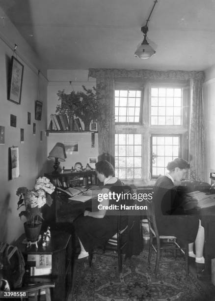 Prefects at Roedean, the exclusive girl's school in Brighton, working in their study.