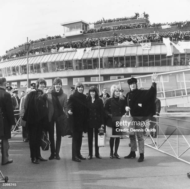 British pop band The Beatles bidding farewell to their fans at London Airport as they leave to continue production of their film 'Help' in Austria....