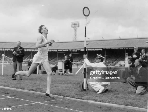 Roger Bannister winning the AAA Championships Mile race.