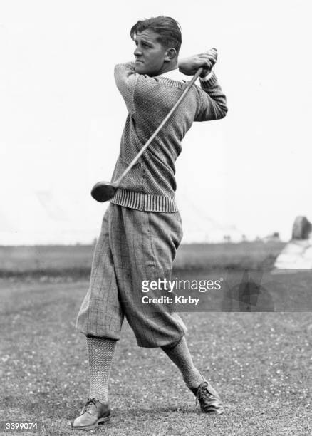 Australasian golfer Len Nettlefold practicing his swing at St Andrews, Fife.