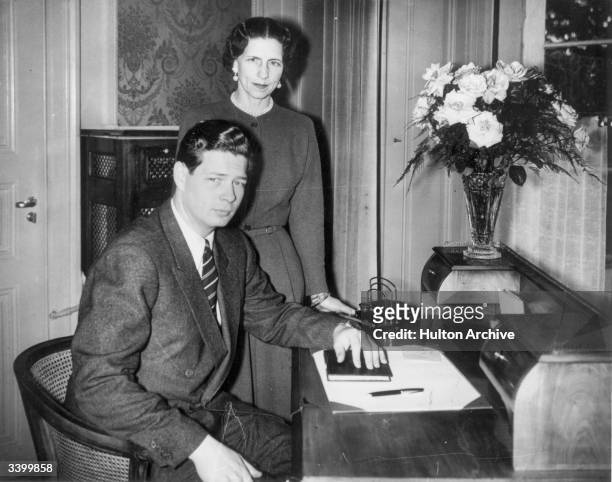 Ex-King Michael of Romania in exile in Lausanne with his mother.