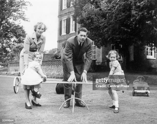 Ex-King Michael of Romania in the garden of his home, Ayot House in Hertfordshire, with his wife, Princess Anne of Bourbon-Parma and their three...