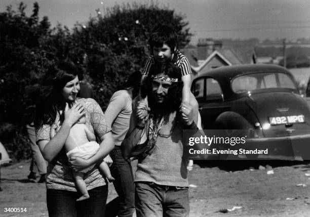 Hippy family at the Isle of Wight pop festival.