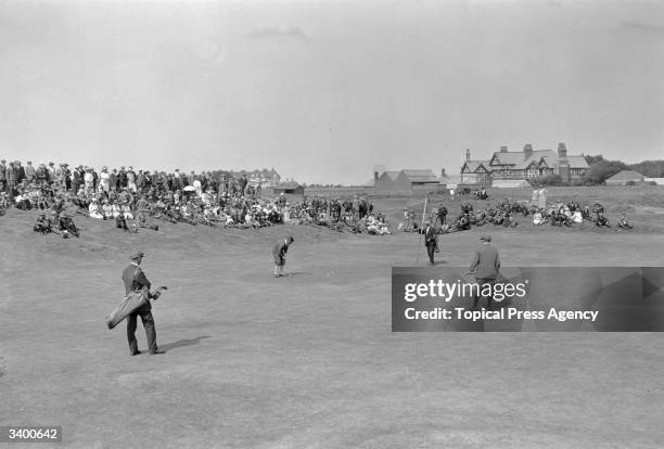 Bobby Jones , champion American golfer who won the British Open three times and the US Open four times , putting at the Amateur Golf Championship at...