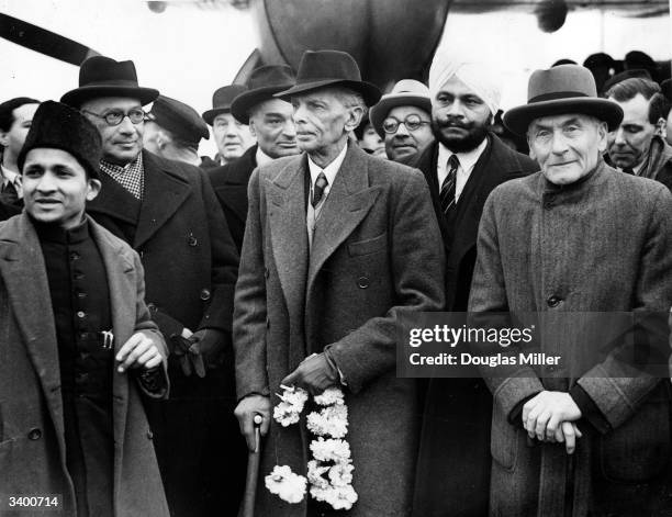 Leader of the Indian Muslim League Muhammad Ali Jinnah arrives at London Airport with viceroy and governor-general of India Lord Wavell , Liaquat Ali...