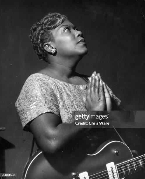 American gospel singer and guitarist Sister Rosetta Tharpe from Arkansas, USA, in Cardiff, south Wales, November 1957. She is touring England...