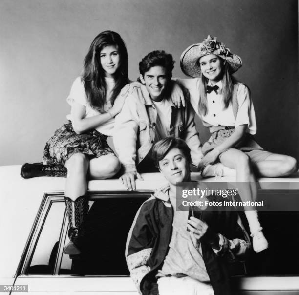 The cast of the television series 'Ferris Bueller' including American actors Jennifer Aniston, Charlie Schlatter, Ami Dolenz and Brandon Douglas,...